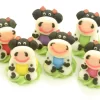 3D-Zuckerfiguren Sitzende Kühe, Rot & Schwarz, 6 Stück á 25 X 25 X 30 Mm