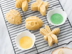 Nordic Ware: Aluguss-Backform Backyard Bugs, Antihaft, 1.200 Ml, 8 Mulden: Schmetterling, Libelle, Marienkäfer, Biene